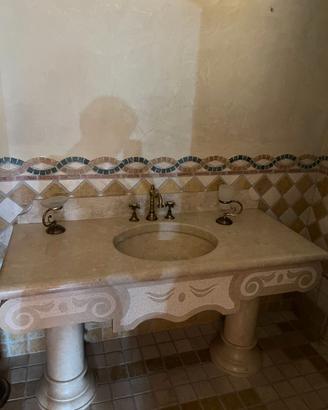 LAVABO IN PIETRA SCOLPITO A MANO
