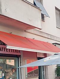 tendone a bracci arancio prezzo un po' trattabile