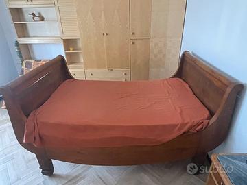 Letto a barca in legno nobile