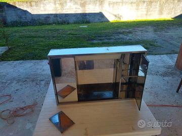 Specchio contenitore