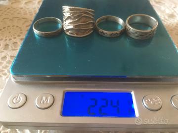 4 anelli argento 925 peso totale 22.41