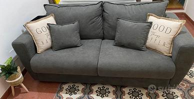 divano letto imbottito grigio