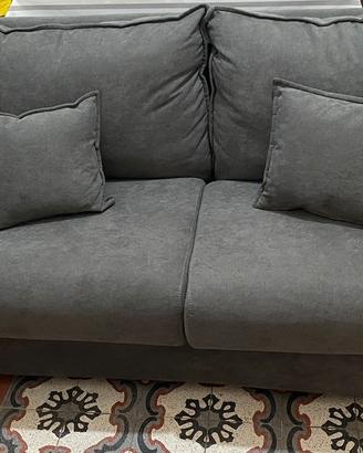divano letto imbottito grigio