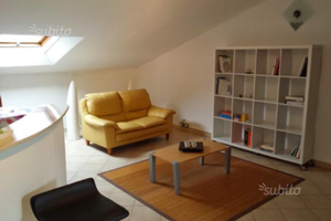 Mansarda in contesto familiare