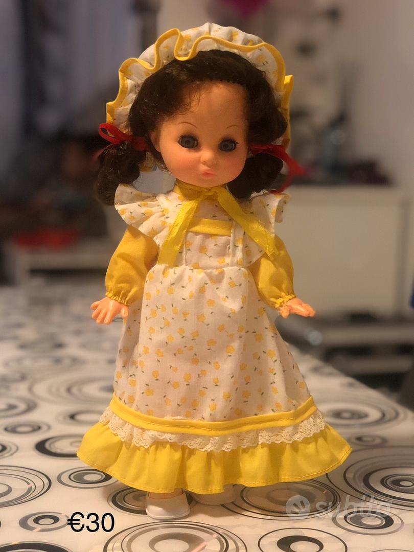 Bambola anni 70/80 vestito giallo Tutto per i bambini In vendita