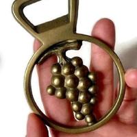 apribottiglie vintage in ottone massiccio 