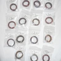 BUSTA 15 PEZZI ANELLI IN LEGNO NUOVI