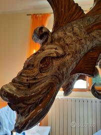 Lampadario legno con teste  di pesce