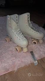 pattini a rotelle oxelo e ginocchiere kipsta