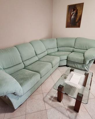 Divano letto verde chiaro a L con chaise longue