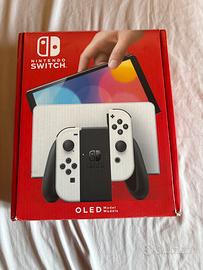 nintendo switch oled + joycon + 4 giochi