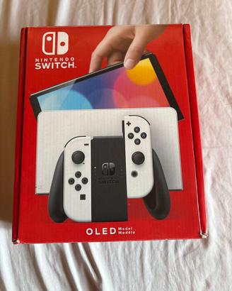 nintendo switch oled + joycon + 4 giochi