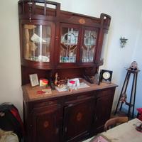 Liberty 900: Vetri Curvi e Intarsi Pregiati