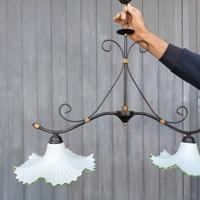 Lampadari in ferro battuto e ceramica