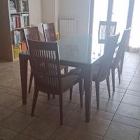 Tavolo calligaris + 6 sedie 600€
