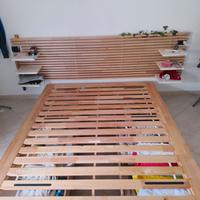 Letto contenitore in legno con testiera