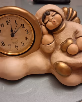 statuina orologio Thun