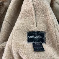 Cappotto con collo e interno in pelliccia