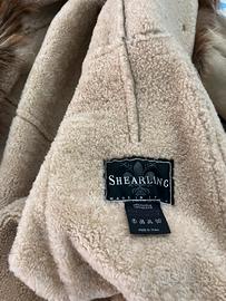 Cappotto con collo e interno in pelliccia