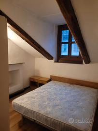 Spazioasa mansarda arredata