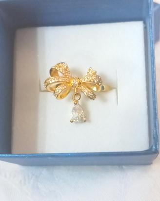 Anello Fiocco con Zircone pendente e zirconi 
