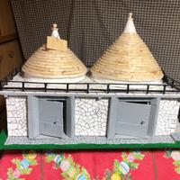 Modellini di trulli in legno.