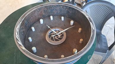 Orologio artigianale da pezzi di bicicletta