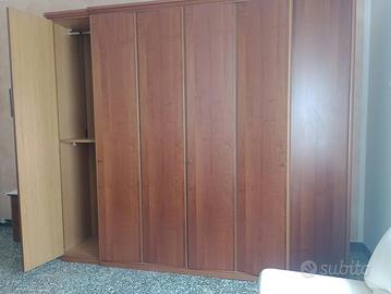 Armadio 6 ante in legno massello