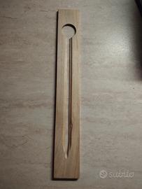 Stecca per lucidare bottoni 