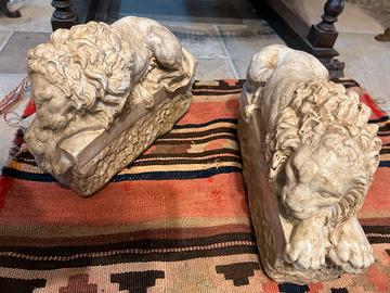 Leoni cenova sculture in marmo ricostruito