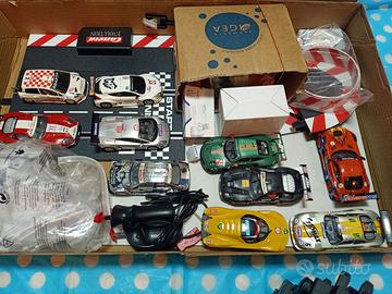 2 piste Carrera EVO ed auto microScalextric