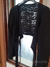 Coprispalle in pizzo nero che si lega in vita