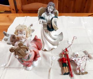 ANGELI IN RESINA E PINOCCHI IN LEGNO