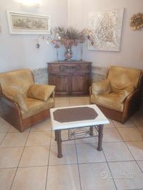 poltrone in legno e pelle