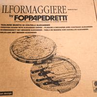 tagliere e coltelli formaggi