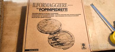 tagliere e coltelli formaggi