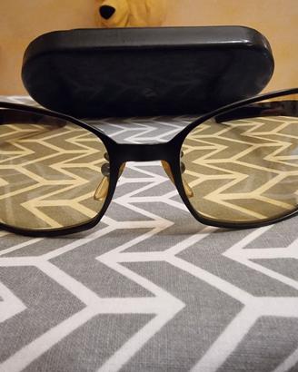 Occhiali Fendi con lenti gialle.