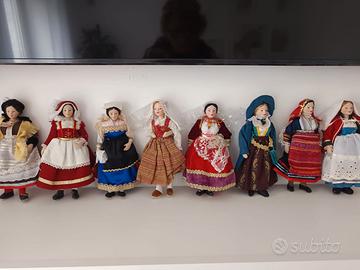 Radici Italia,Bambole in ceramica e costumi tipici
