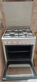 Cucina a Gas 4 fuochi  con forno | SMEG