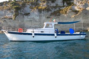 Gozzo cabinato in legno con pilotina 9,8m 100CV