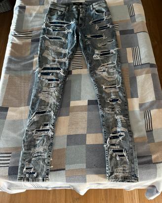 Jeans Represent distressed strappati