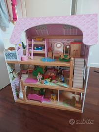 Casa in legno famiglia a tre piani