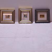 quadri in bassorilievo raffigurante un pae