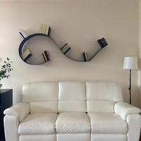 Divano tre posti in pelle bianca