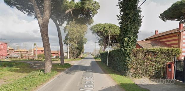 Fiumicino appartamento con giardino e posto auto