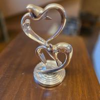 Scultura in argento “volo d’amore” Fontana