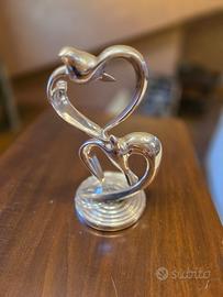 Scultura in argento “volo d’amore” Fontana