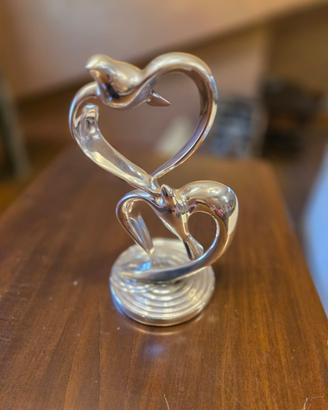 Scultura in argento “volo d’amore” Fontana