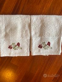 Coppia asciugamani ospite panna e fiori
