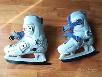 Pattini ghiaccio bambino bianchi/lilla 28-30